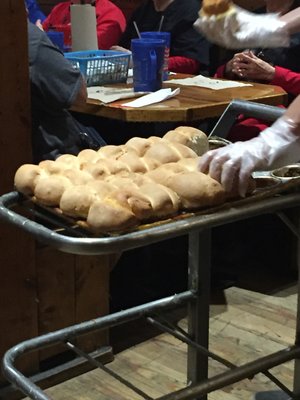 They throw these yeast rolls to you