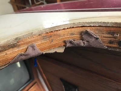 Upper driver side window corner. No water damage to window opening. Water was leaking through the foam rubber seal at the top of the window frame and then dripping onto the pad behind the couch.