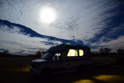 6:30 am under a full moon while tea is brewing inside