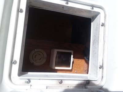 installed twist lock inside the electric service box.  Notice the cut out on the bottom to fit the cords.