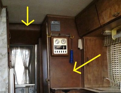 Brown Vinyl wall in Kitchen area, padded brown vinyl bulkhead above rear entry door.